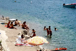 swimming in front of Villa-Bili